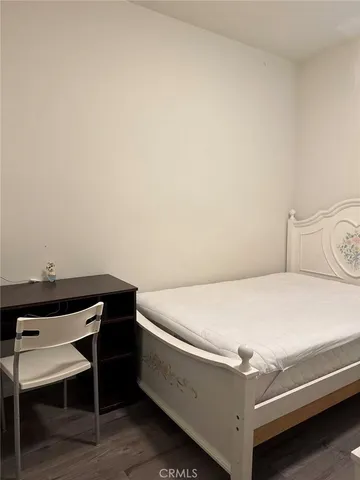 a utility room with dryer and table