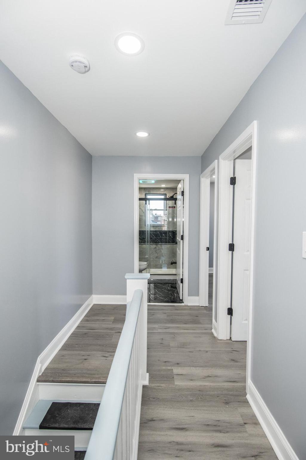 460 Robbins Street Philadelphia, PA 19111 - Photo 18 of 34 a view of a room with wooden floor and staircase