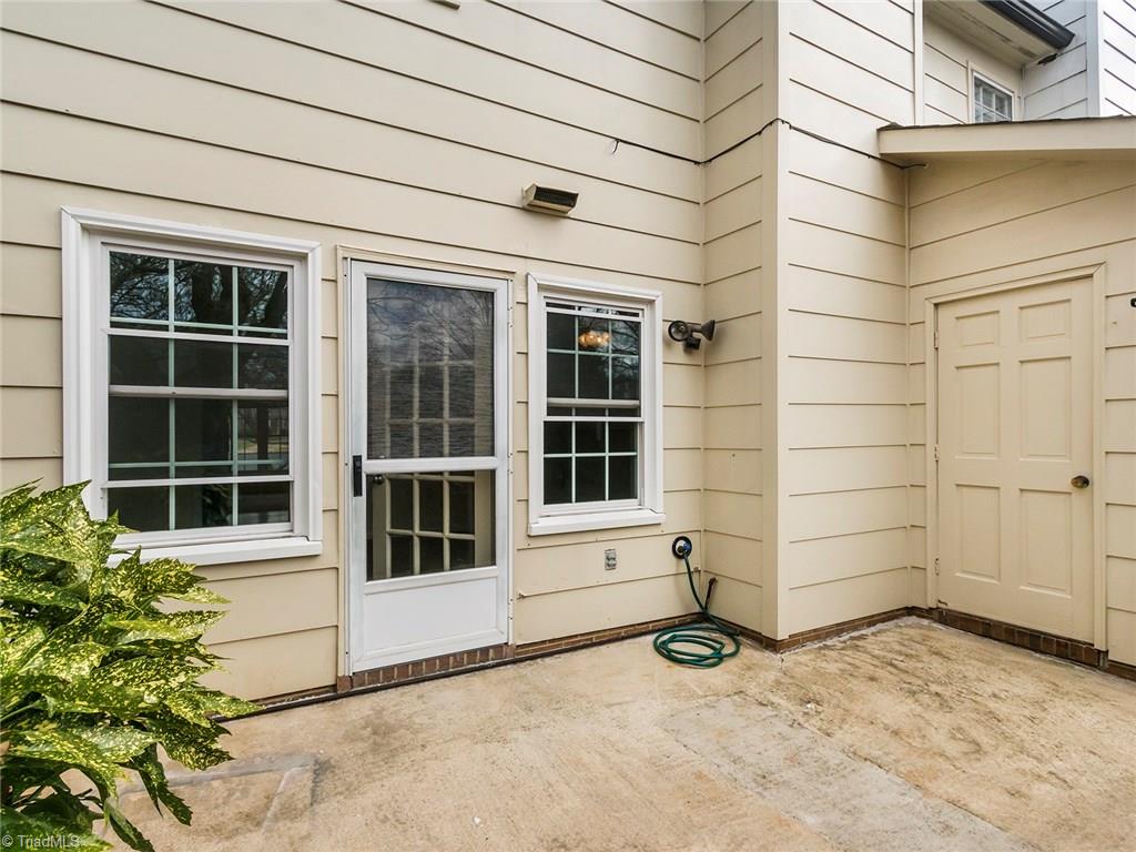 4832 Tower Road, Unit B Greensboro, NC 27410 - Photo 2 of 24 Great patio area with storage closet. Perfect for a table and chairs.