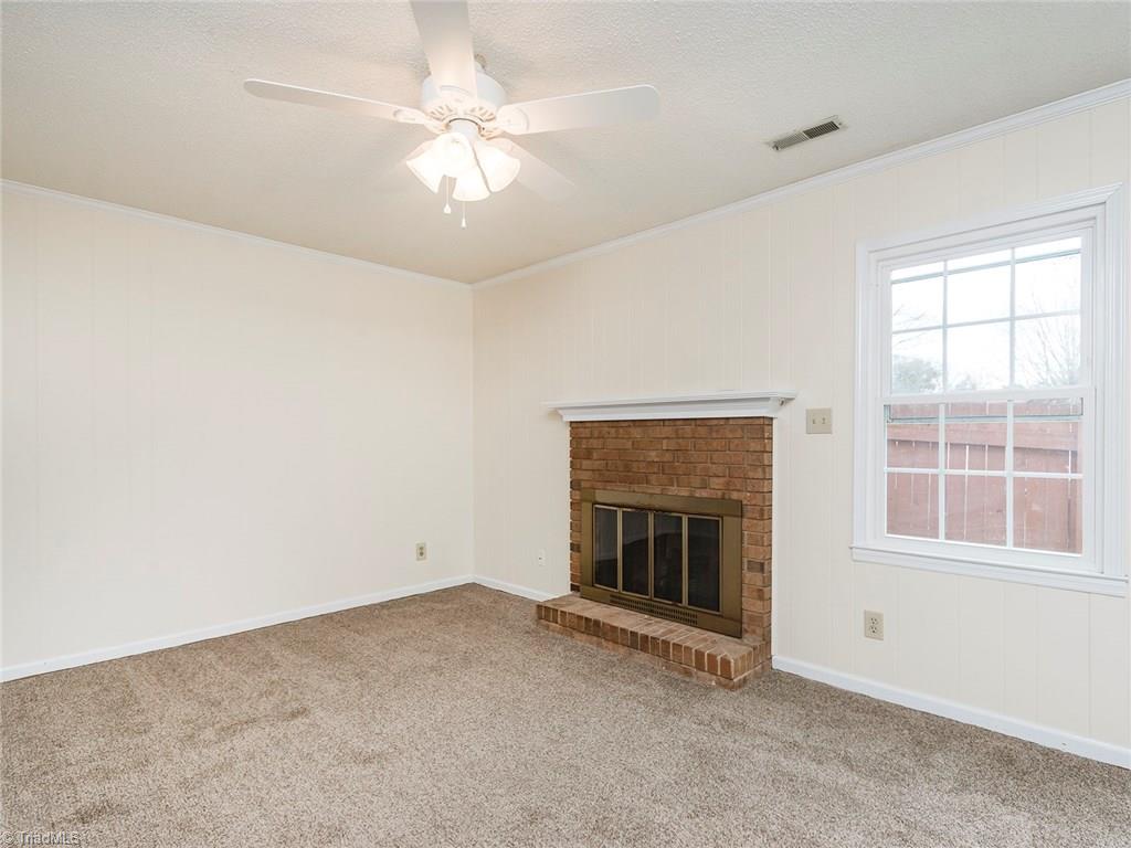 4832 Tower Road, Unit B Greensboro, NC 27410 - Photo 12 of 24 Gas log fireplace in living room!!