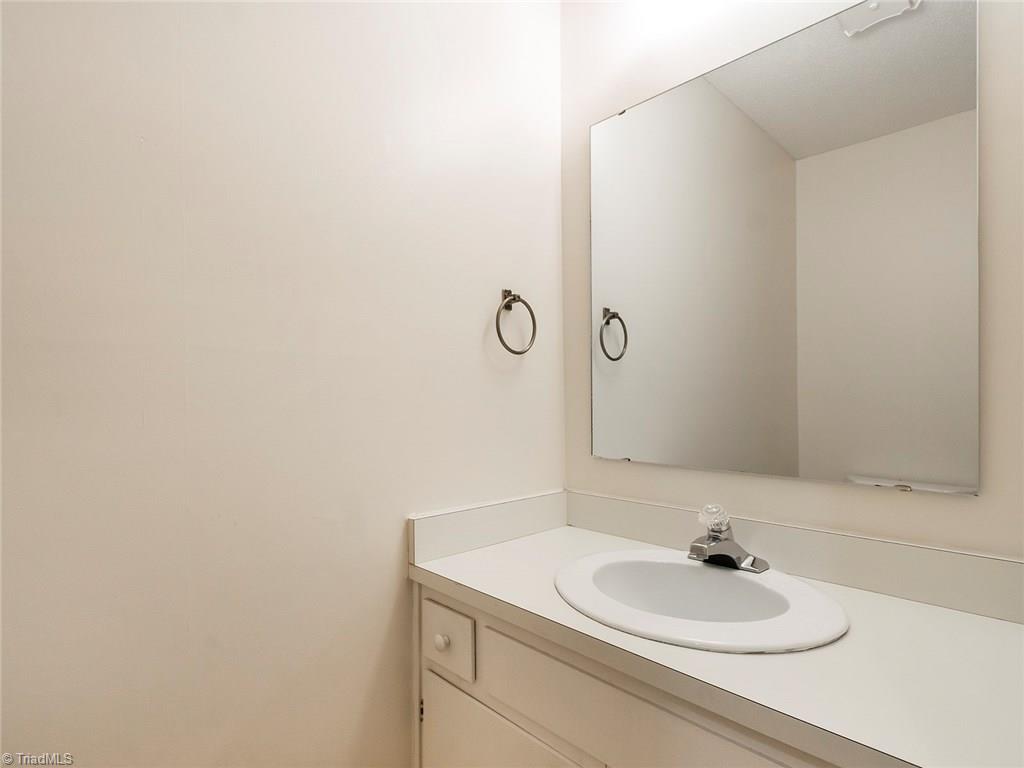 4832 Tower Road, Unit B Greensboro, NC 27410 - Photo 14 of 24 Half bath on main.