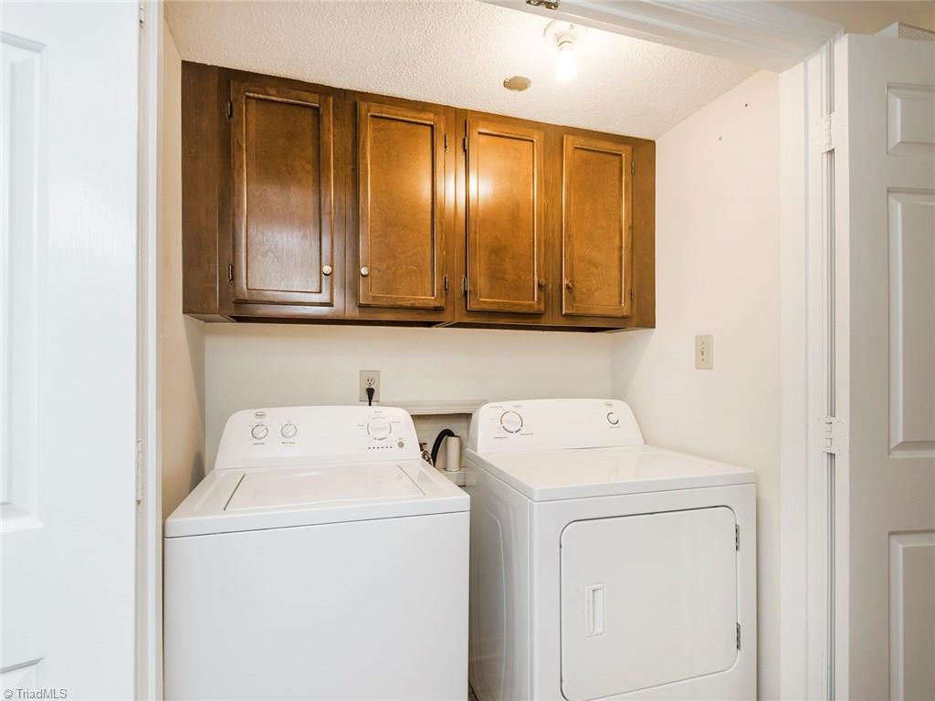 4832 Tower Road, Unit B Greensboro, NC 27410 - Photo 15 of 24 Laundry closet with storage!