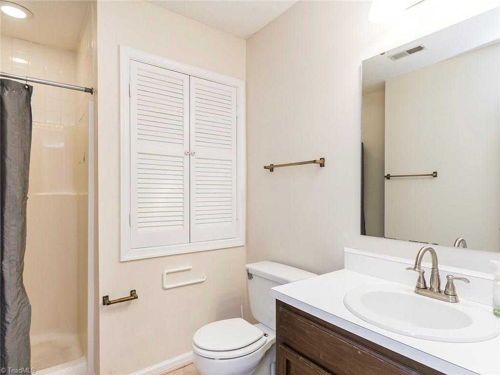 4832 Tower Road, Unit B Greensboro, NC 27410 - Photo 17 of 24 Master bath offers stand alone shower!