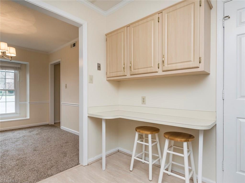 4832 Tower Road, Unit B Greensboro, NC 27410 - Photo 8 of 24 Bar seating in kitchen.