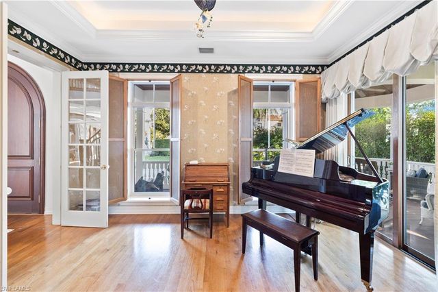 a view of a porch with wooden floor