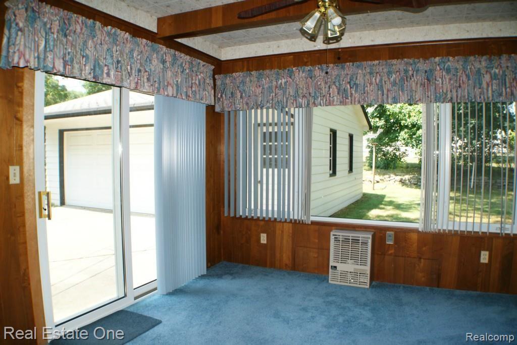 421 Rewold Drive Rochester, MI 48307 - Photo 9 of 27 Family Room Doorwall leads to patio