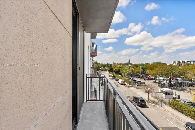 a view of a balcony with city view