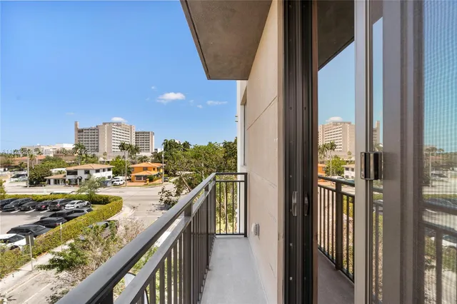 a view of a balcony with city view