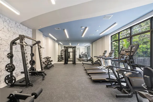 a view of a room with gym equipment