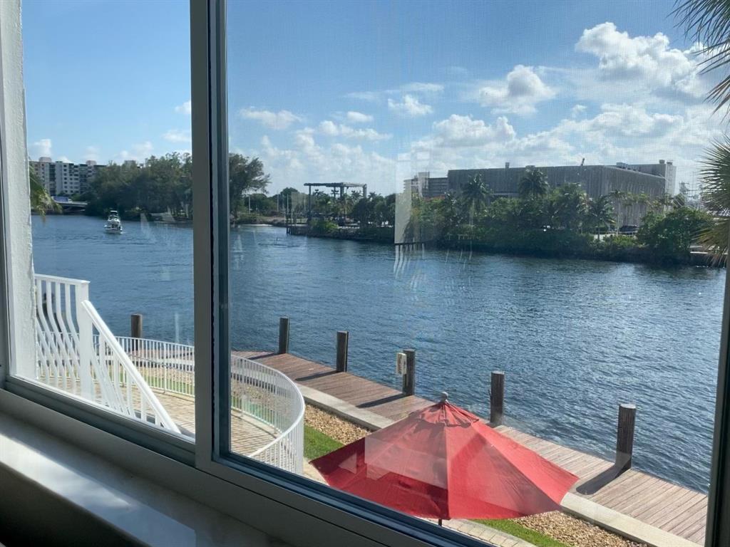 1705 North Riverside Drive, Unit 8 Pompano Beach, FL 33062 - Photo 11 of 40 a view of a balcony with lake view and mountain view