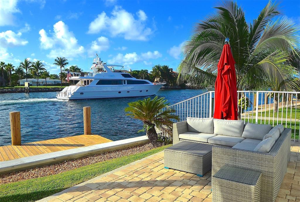 1705 North Riverside Drive, Unit 8 Pompano Beach, FL 33062 - Photo 25 of 40 a view of a chairs and table in the patio