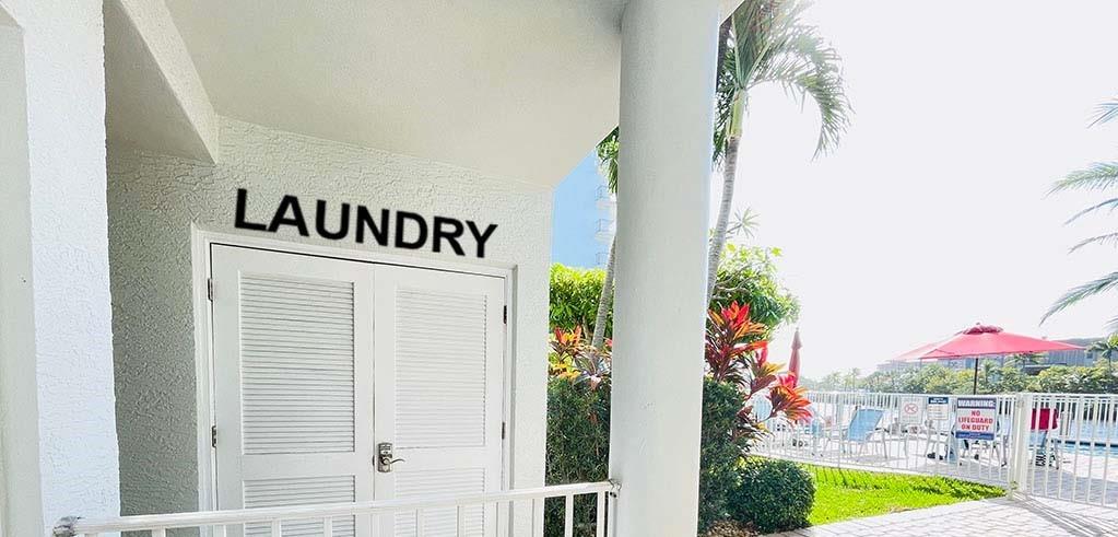 1705 North Riverside Drive, Unit 8 Pompano Beach, FL 33062 - Photo 32 of 40 a sign that is on the wall of a house