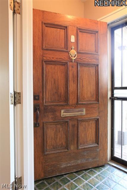 3250 Chadbourne Road Cleveland, OH 44120 - Photo 4 of 22 This newer wood door adds to the homeâ??s character.