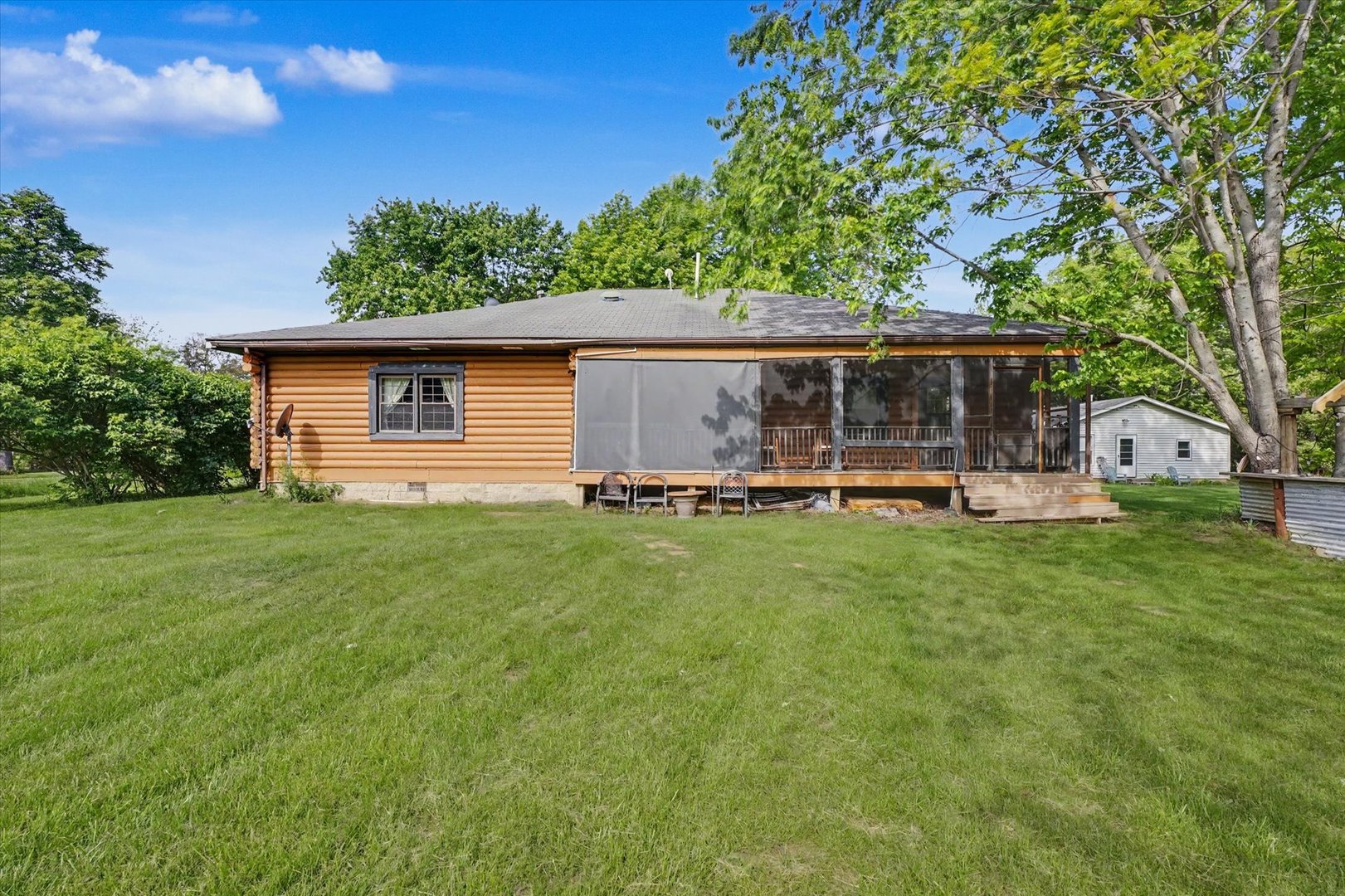 2431 North 1450 East Road Mansfield, IL 61854 - Photo 60 of 78 a view of a house with backyard and porch