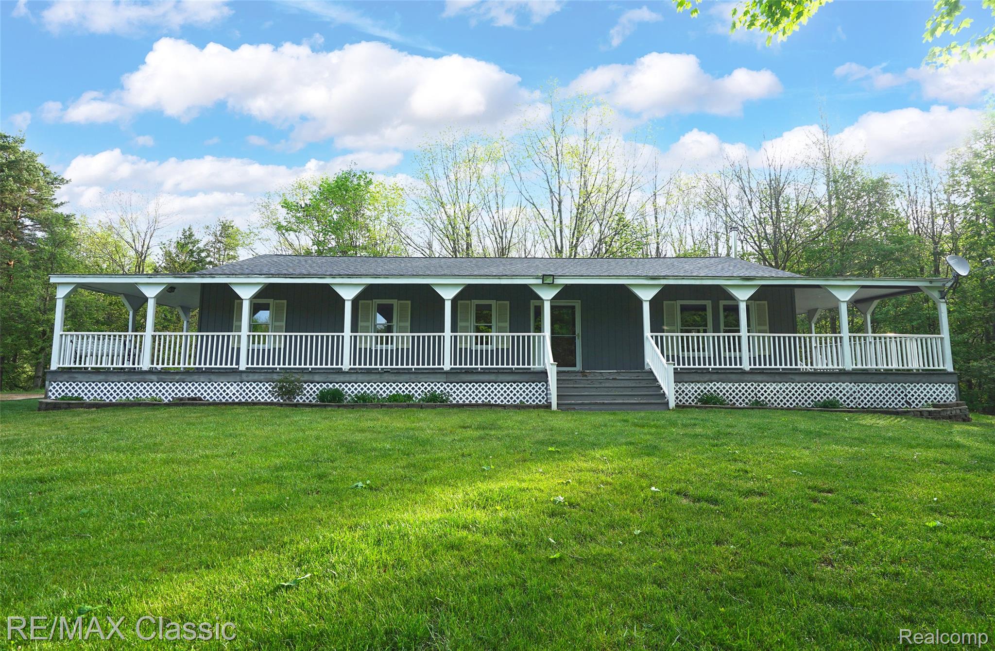 4611 Murray Road Mayville, MI 48744 - Photo 9 of 50 Massive wrap-around porch