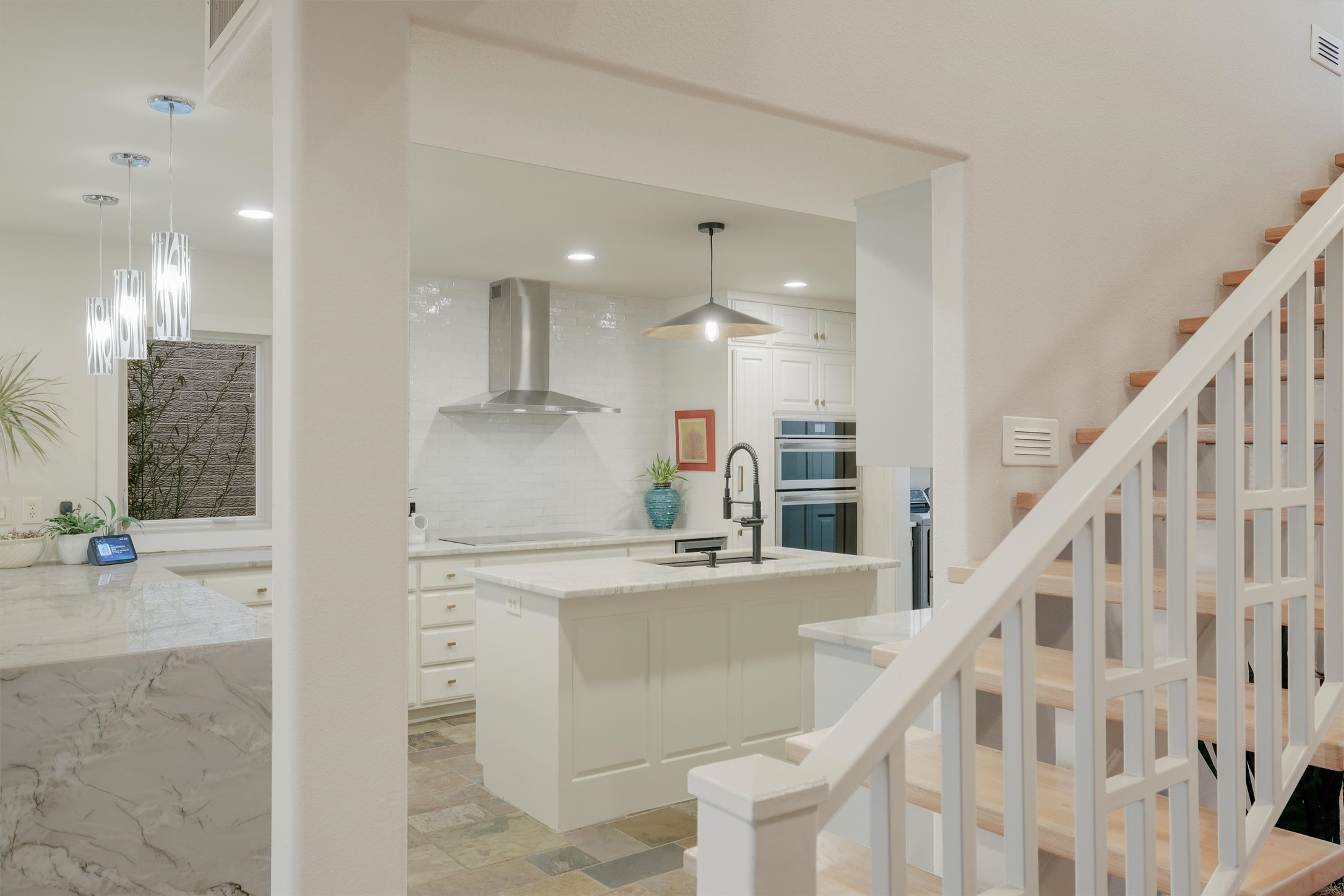 1807 Terminal Loop Road McQueeney, TX 78123 - Photo 10 of 33 a kitchen with kitchen island a counter top space appliances and a view of living room