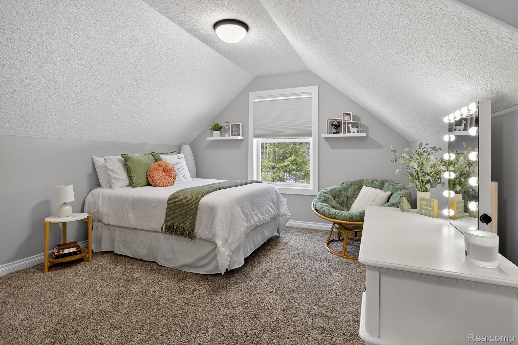 101 Highview Road Traverse City, MI 49696 - Photo 51 of 88 Carpeted bedroom featuring baseboards and a textured ceiling