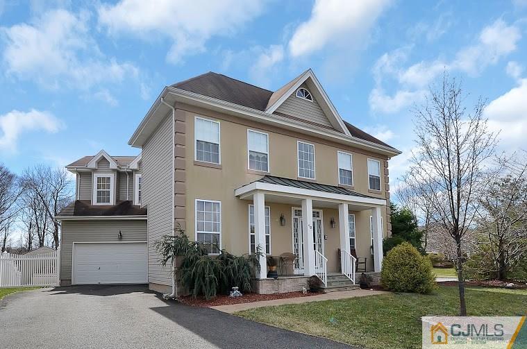72 Timber Ridge Road North Brunswick, NJ 08902 - Photo 1 of 25 a front view of a house with garden