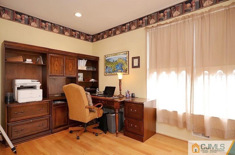 72 Timber Ridge Road North Brunswick, NJ 08902 - Photo 12 of 25 a view of a workspace with furniture and a window