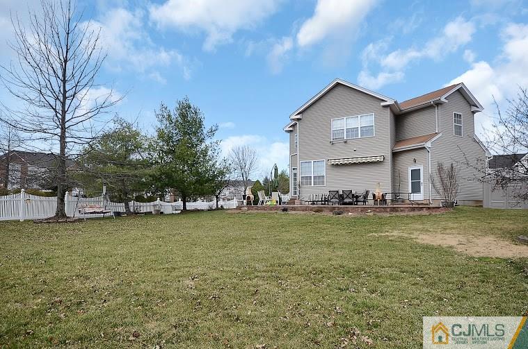 72 Timber Ridge Road North Brunswick, NJ 08902 - Photo 24 of 25 a view of a house with a yard and sitting area