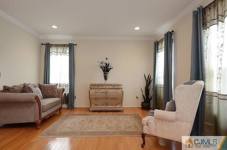 72 Timber Ridge Road North Brunswick, NJ 08902 - Photo 4 of 25 a living room with furniture and a window