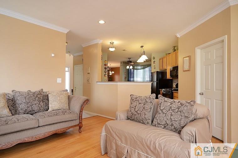 72 Timber Ridge Road North Brunswick, NJ 08902 - Photo 9 of 25 a living room with furniture and a couch