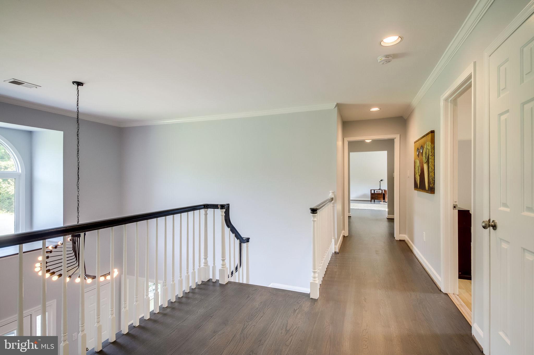 1167 Reston Avenue Herndon, VA 20170 - Photo 30 of 60 Upper level landing with new wood floors