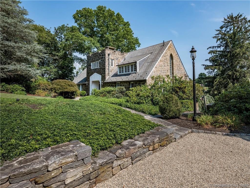 1 Neck Road Old Lyme, CT 06371 - Photo 36 of 39 a view of a house with a yard and large trees