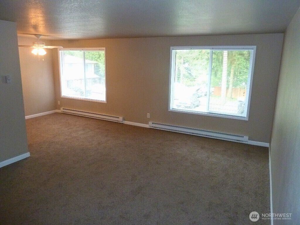 18332 Hurst Road Lynnwood, WA 98037 - Photo 8 of 9 a view of an empty room with a window