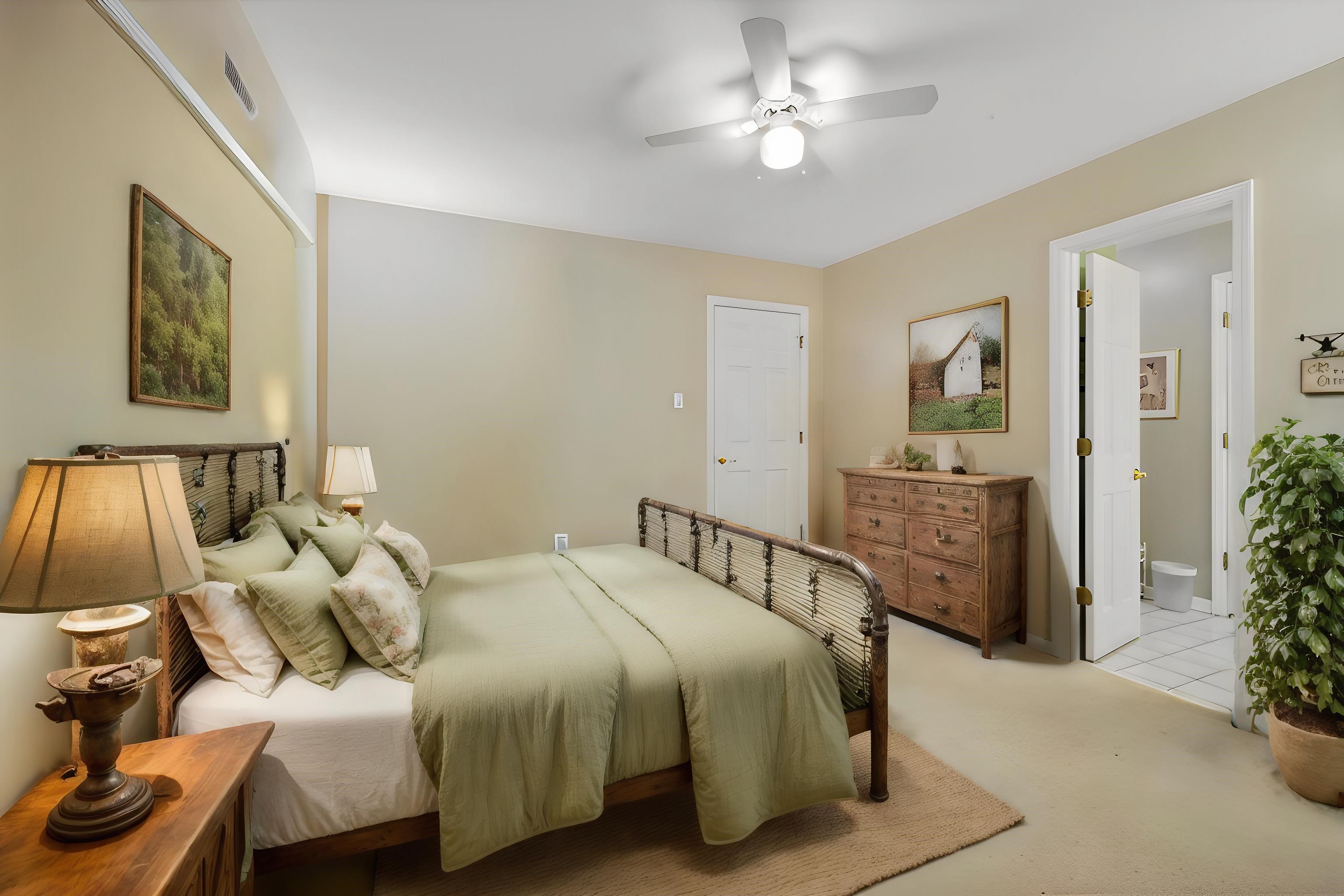 11811 George R James Road Eads, TN 38028 - Photo 18 of 29 BEDROOM 4 SUITE UP features Carpet, Plantation Shutters, Smooth Ceiling fan, Walk-In Closet PLUS shares a Full Bath which connects to the Hallway. This photo is virtually staged.