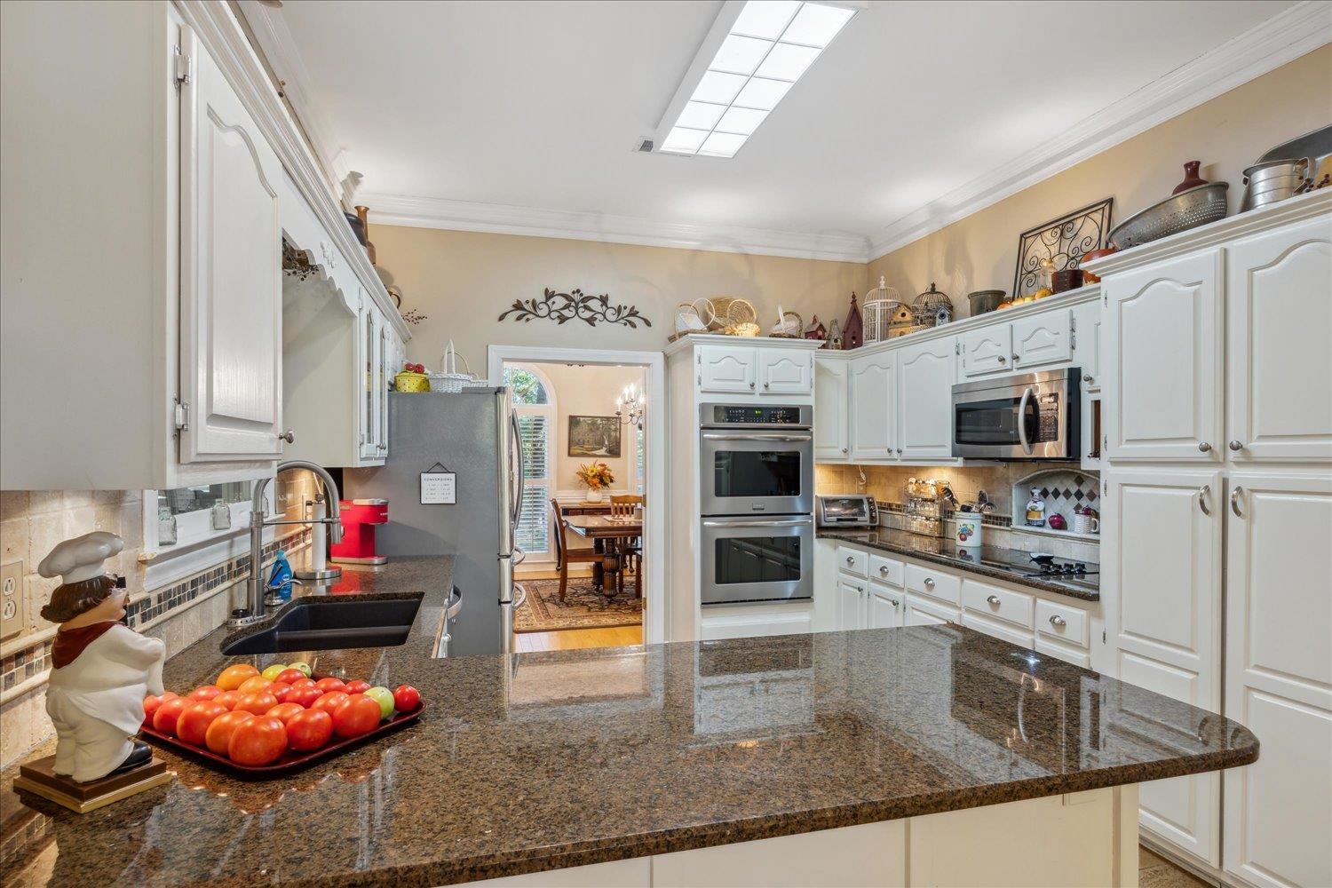 11811 George R James Road Eads, TN 38028 - Photo 8 of 29 BREAKFAST BAR in Kitchen offers Casual Eating Space