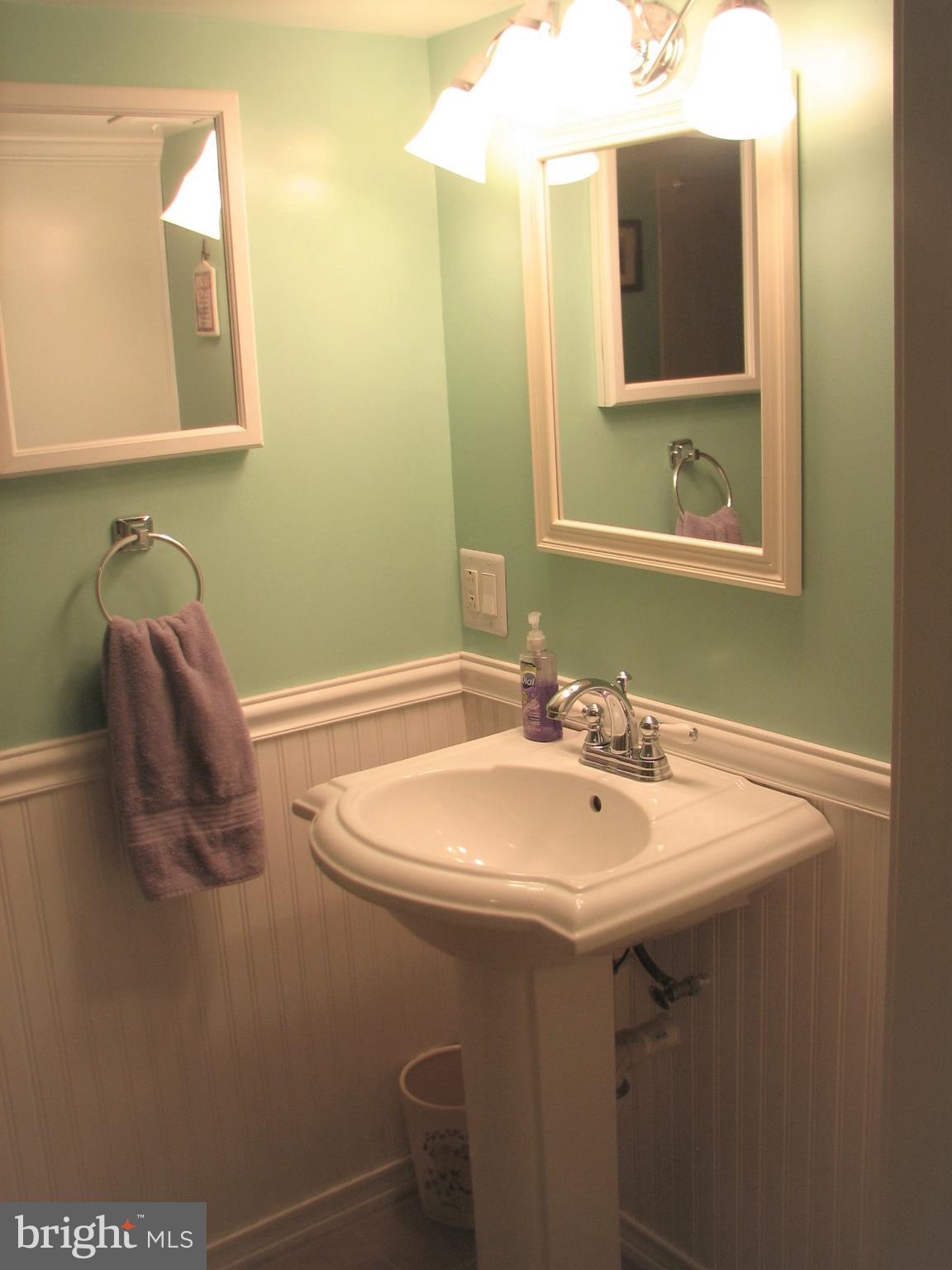 706 Ware Street Southwest Vienna, VA 22180 - Photo 16 of 30 Pedestal sink in full bath lower level