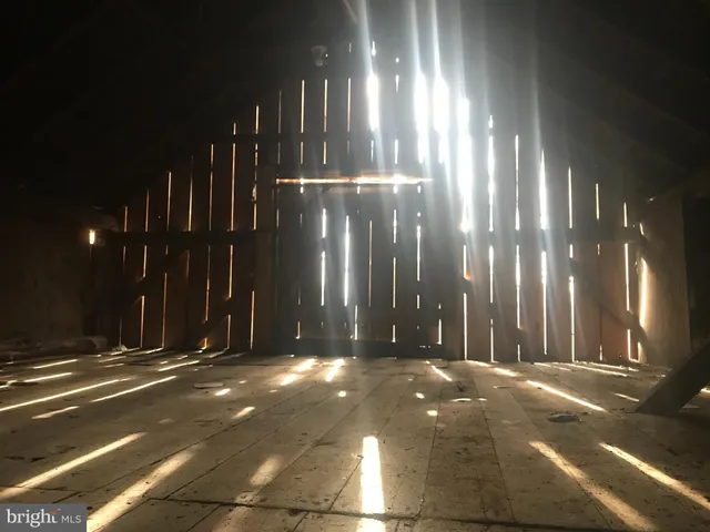 a view of a building in a yard