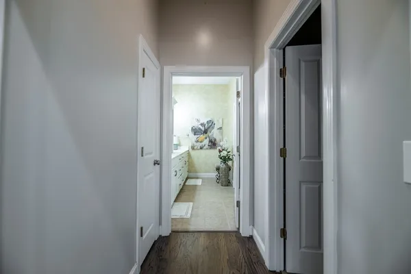 a bathroom with a double vanity sink and mirror