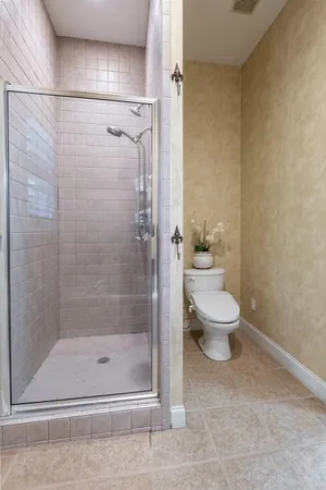 a bathroom with a tub and a shower