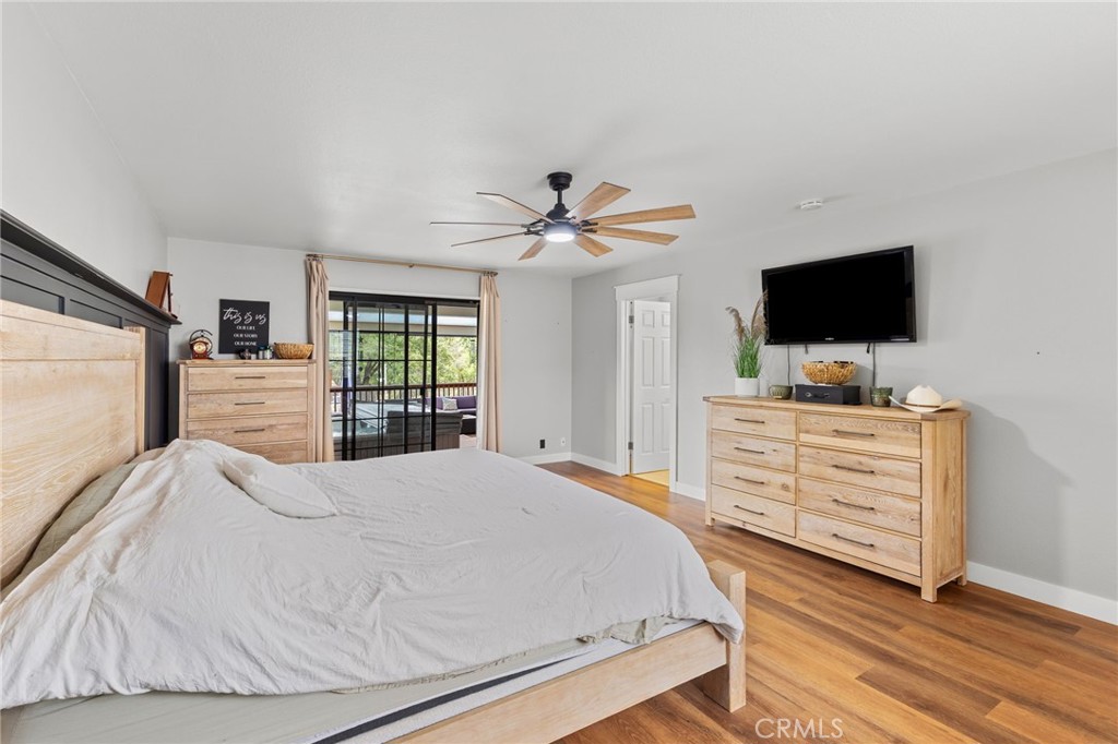 83 Gopher Road Oroville, CA 95966 - Photo 23 of 69 a bedroom with a bed and a flat screen tv