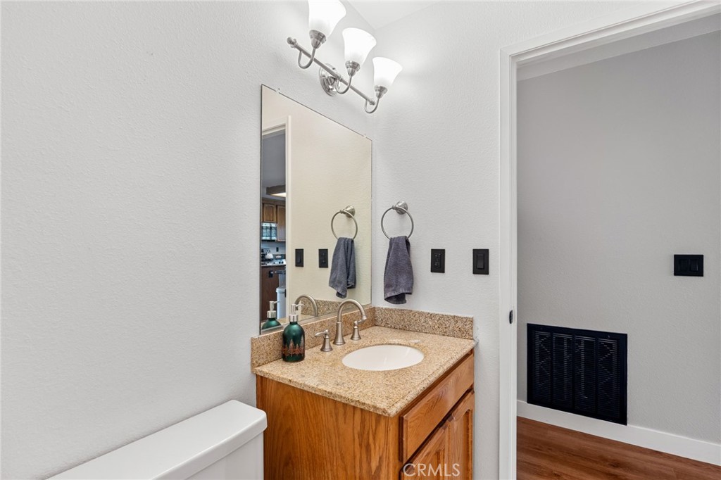 83 Gopher Road Oroville, CA 95966 - Photo 27 of 69 a bathroom with a sink and a mirror