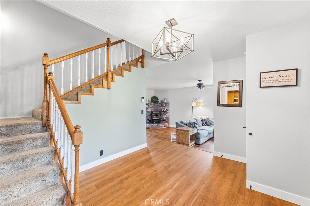 83 Gopher Road Oroville, CA 95966 - Photo 30 of 69 a view of a hallway with wooden floor and staircase