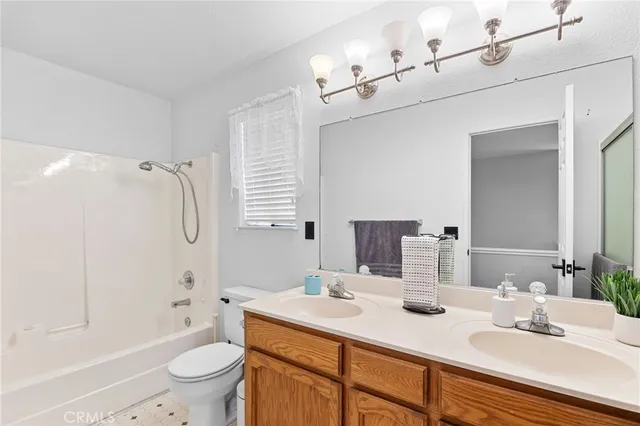 a view of a swimming pool with a yard