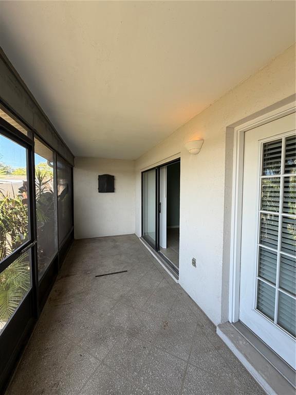 2131 Ridge Road South, Unit 135 Largo, FL 33778 - Photo 32 of 33 an empty room with windows