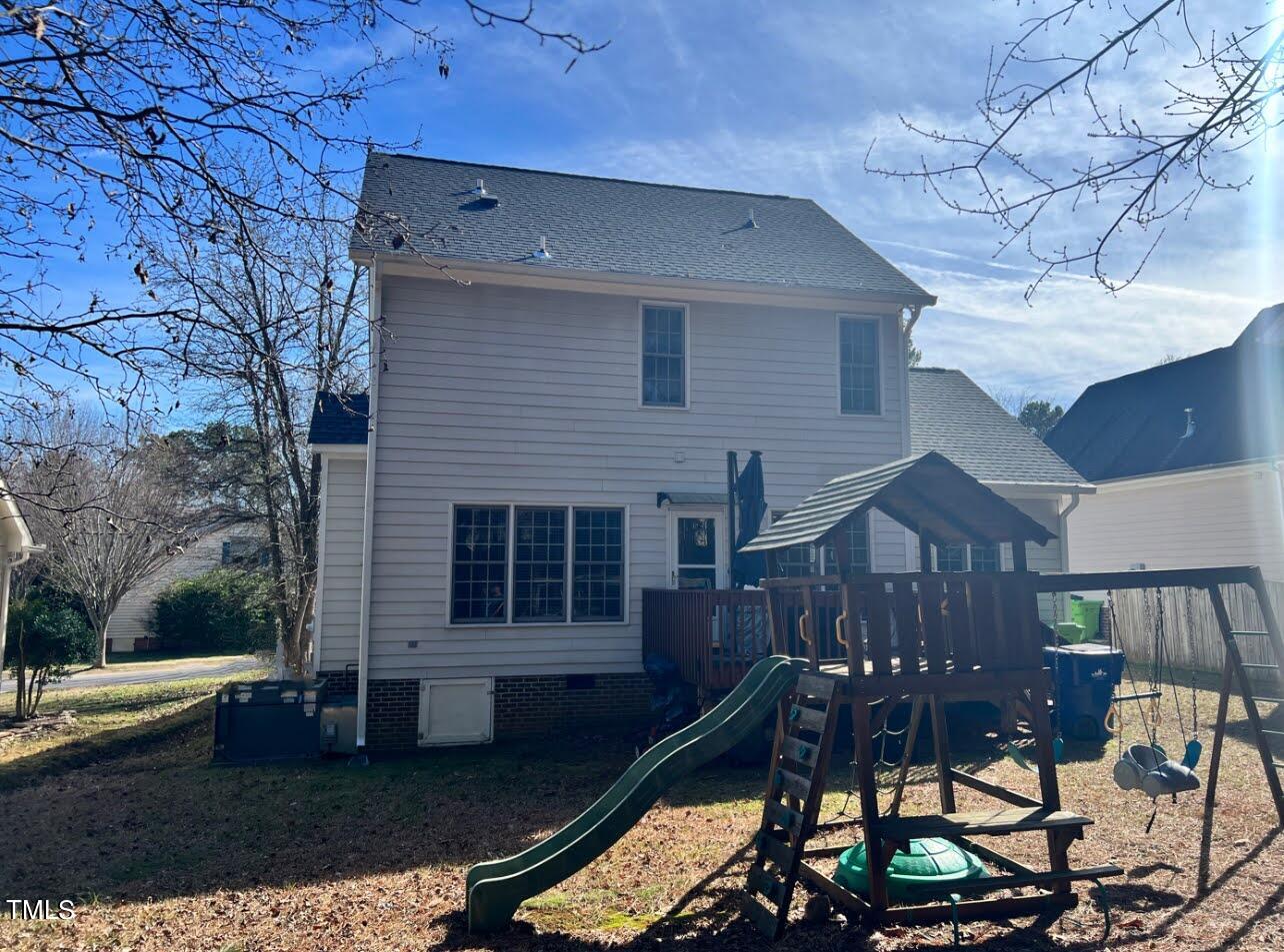 7709 Harps Mill Woods Run Raleigh, NC 27615 - Photo 15 of 15 a front view of house with patio