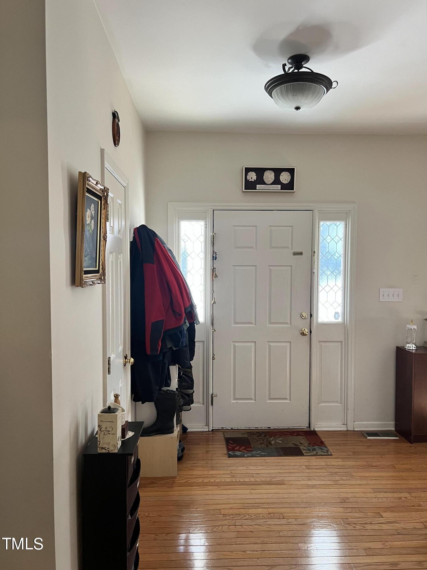 7709 Harps Mill Woods Run Raleigh, NC 27615 - Photo 2 of 15 a view of a living room
