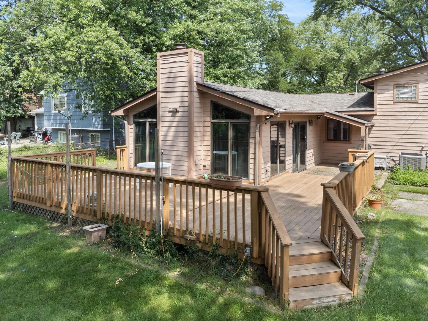 101 Seabury Road Bolingbrook, IL 60440 - Photo 13 of 27 a view of a house with a wooden deck