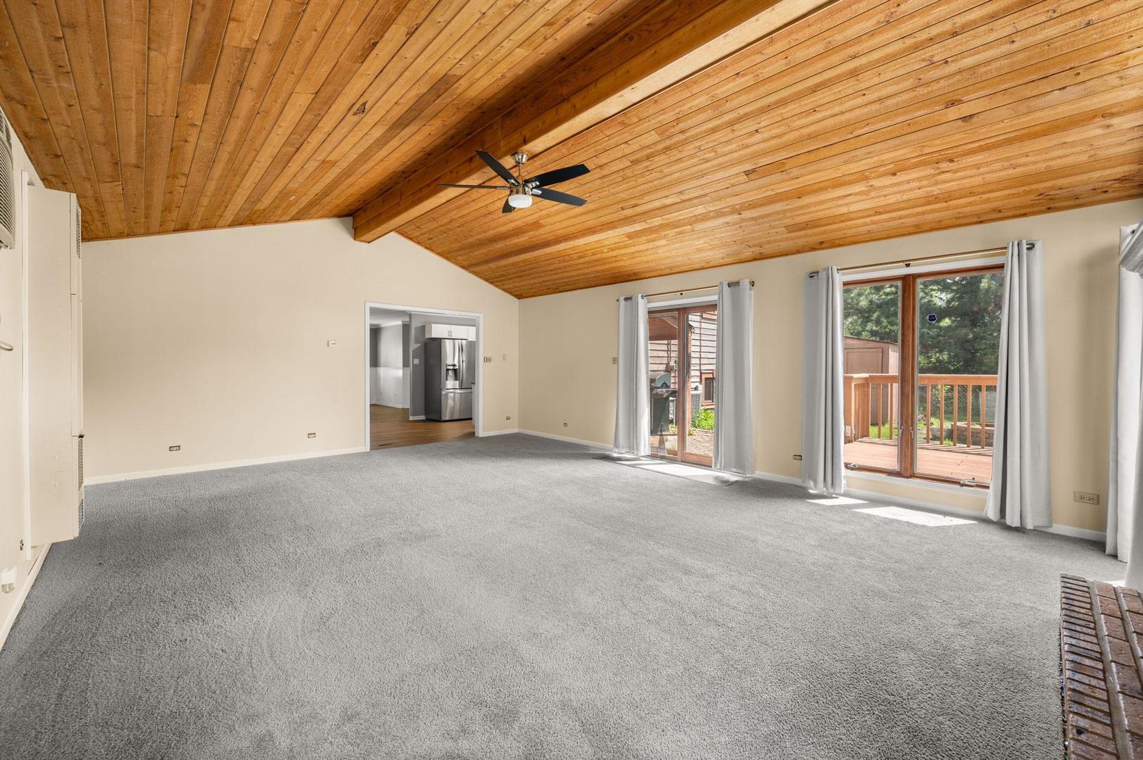 101 Seabury Road Bolingbrook, IL 60440 - Photo 23 of 27 a view of an empty room with a ceiling fan