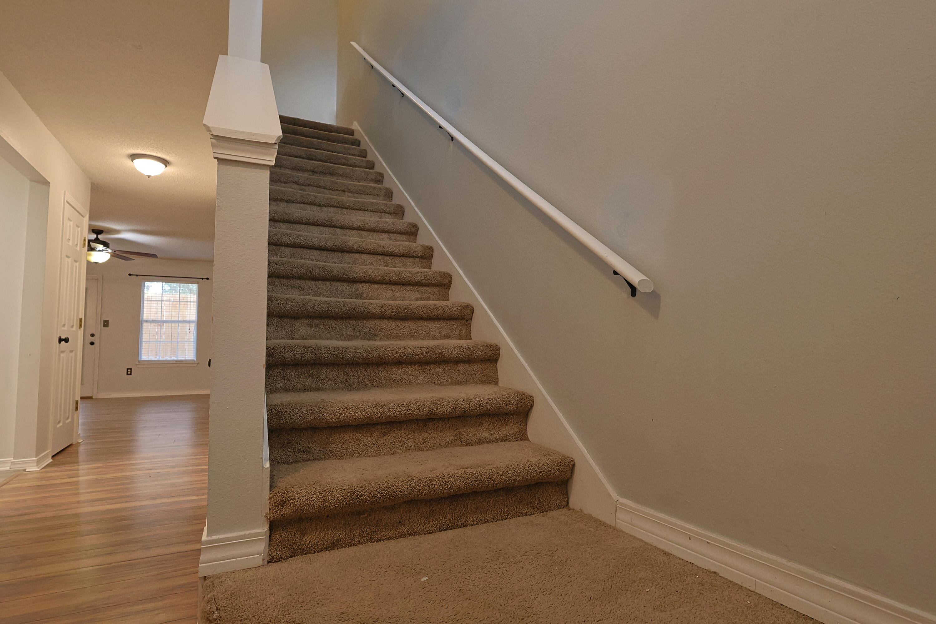 487 Keystone Road Mary Esther, FL 32569 - Photo 14 of 35 a view of entryway and hall with wooden floor