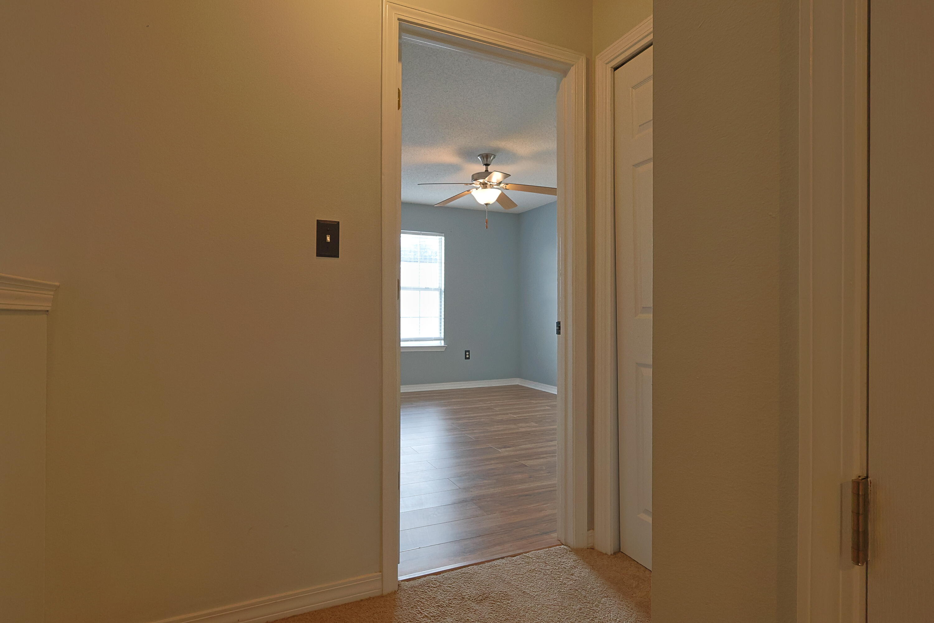 487 Keystone Road Mary Esther, FL 32569 - Photo 15 of 35 a view of a hallway with wooden floor