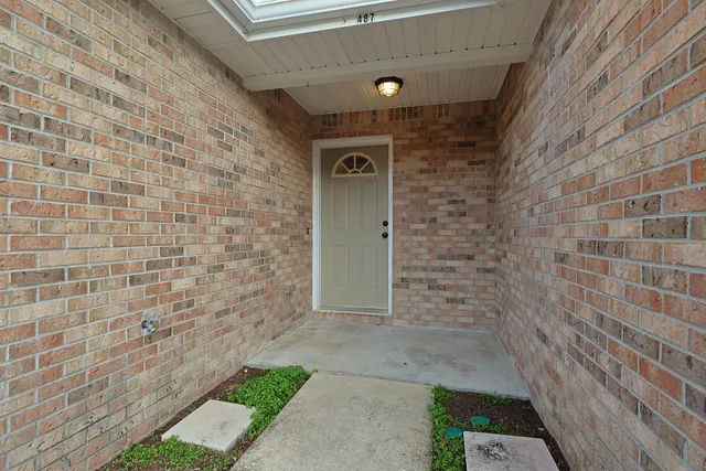 a view of a brick wall