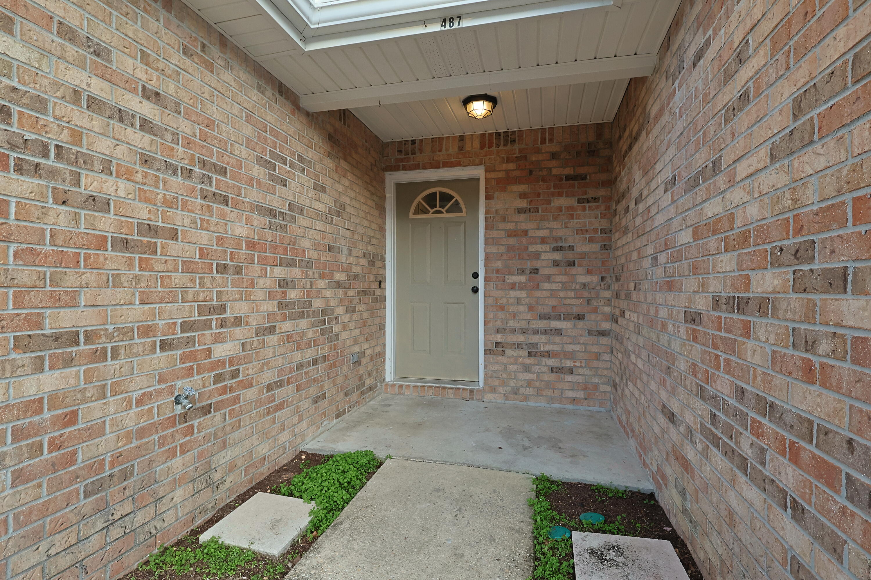 487 Keystone Road Mary Esther, FL 32569 - Photo 33 of 35 a view of a brick wall