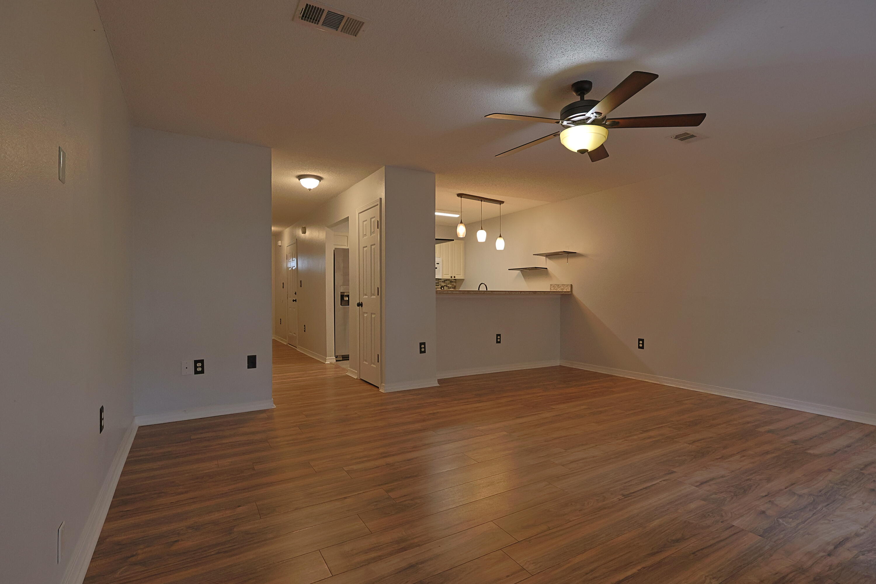 487 Keystone Road Mary Esther, FL 32569 - Photo 5 of 35 a view of empty room with wooden floor