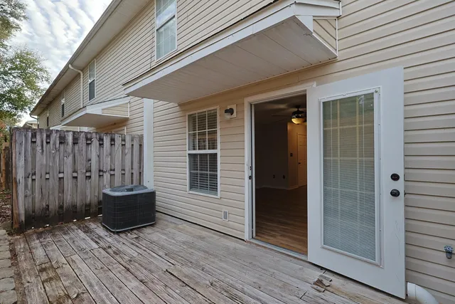 a view of house with wooden floor and outdoor space